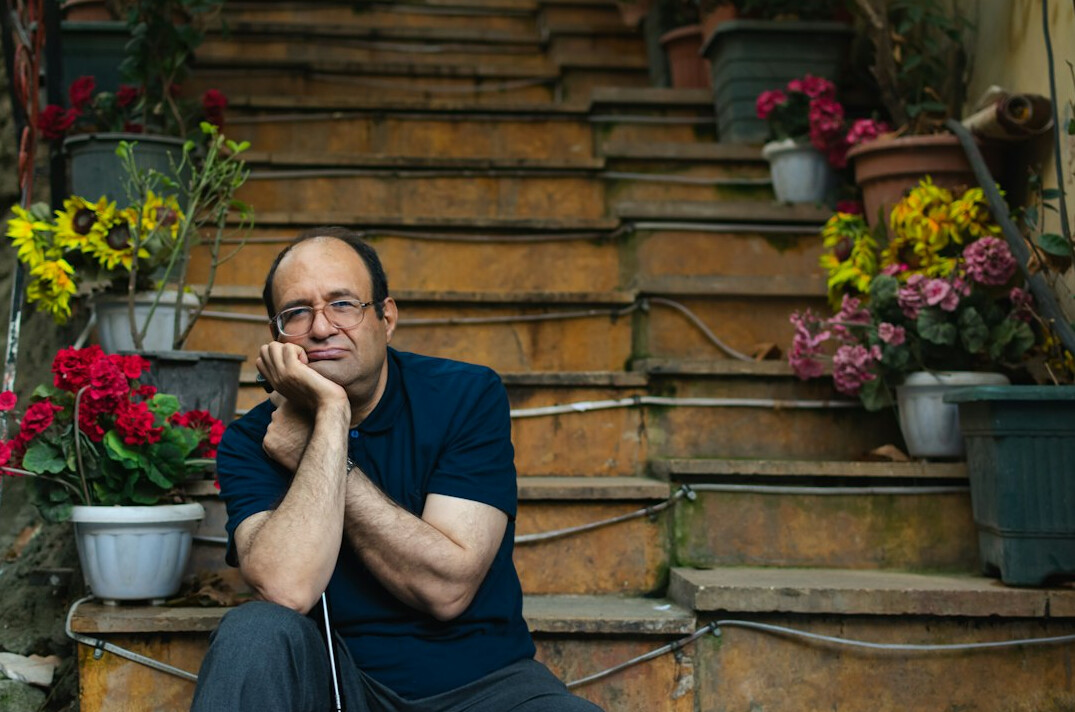 Portrait of a Latino man editor in his forties
