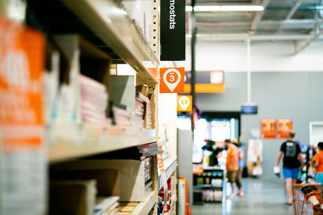supermarket aisle with people